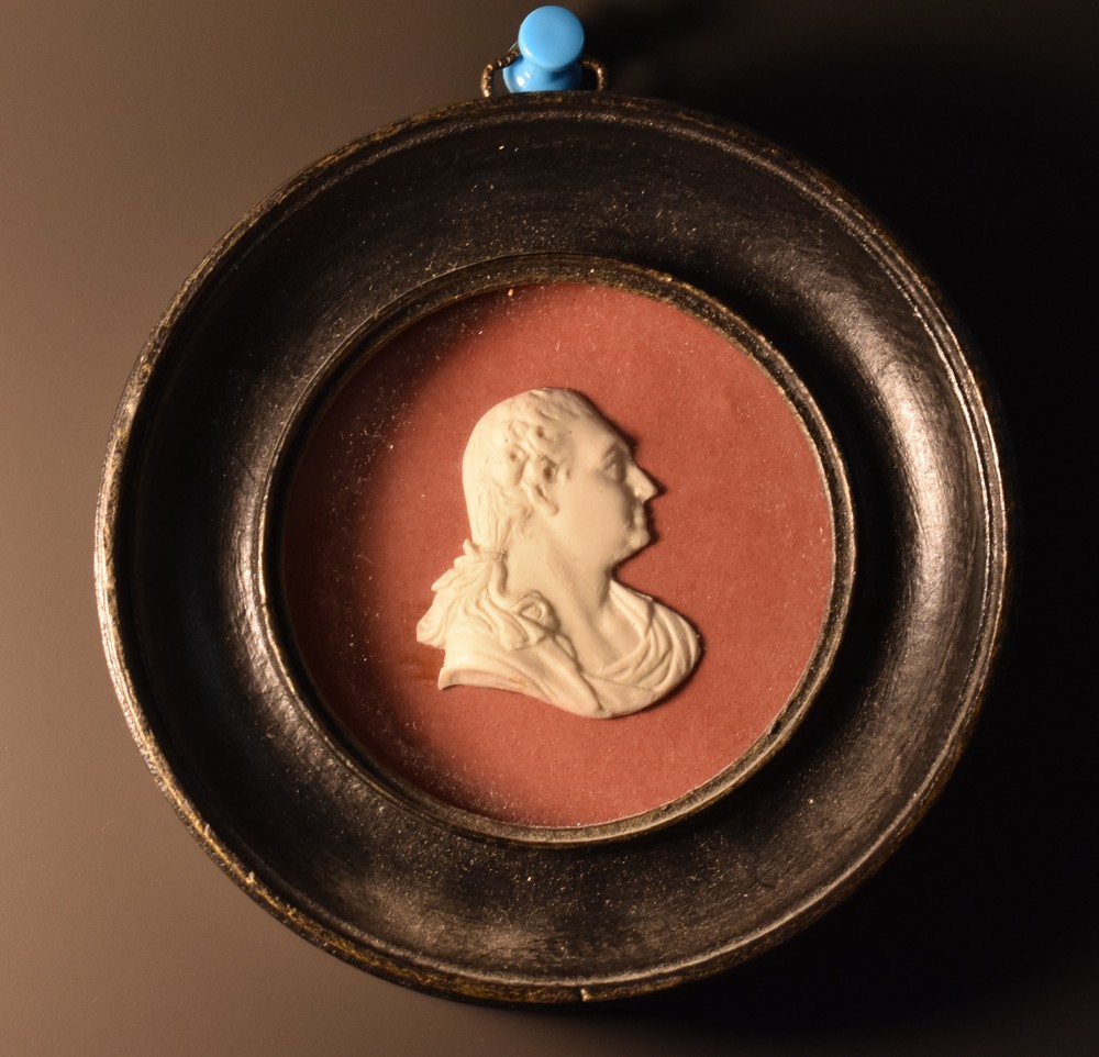 A 19th century bisque relief portrait, of Louis XVI, 4cm x 3cm,