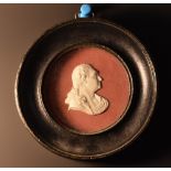 A 19th century bisque relief portrait, of Louis XVI, 4cm x 3cm,