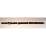 Musical Instruments - a mid-19th century five-section rosewood flute, by Fentum, 29 Queen's Way,