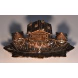 A Black Forest novelty inkstand, the central stamp box as an alpine chalet,