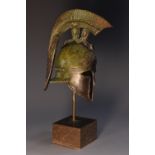 A museum type verdigris patinated bronze model, of an Ancient Greek Corinthian helmet, marble base,