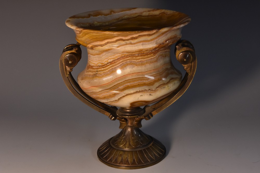 A 19th century French bronze and banded onyx campana mantel vase, scroll handles,