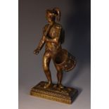 A 19th century French dark patinated bronze table vesta, cast as a Revolutionary soldier,