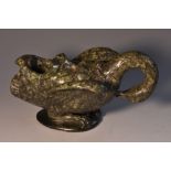 A 19th century Italian Grand Tour serpentine inkwell, as a swan with a grotesque mask to it's back,