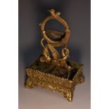 A 19th century gilt bronze and verde antico marble pocket watch stand, cast with stylised beasts,