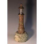 A Cornish serpentine table lamp, as a lighthouse, 35cm high,