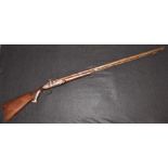 A 19th century Indian percussion rifle, 100cm sighted barrel stamped 148, steel ramrod,