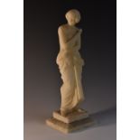 Italian School (19th century), a Carara marble, of a beauty, holding a single flower,