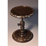 A 19th century Anglo-Indian coromandel table top adjustable candle stand, dished top,