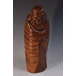 A large Chinese bamboo carving, of a rotund smiling monk, 38cm high,