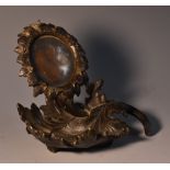 A 19th century dark patinated bronze pocket watch stand, cast as a sunflower, 13cm high, c.