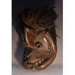 Tribal Art - a Dan/Gio mask, concave face with pronounced nose and tubular eyes,