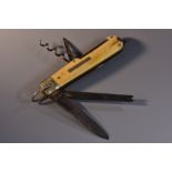 An early 20th century fisherman's weighing scale pocket knife, comprising three blades,