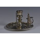 A George III silver chamberstick, quite plain, urnular sconce, baluster column, chained snuff,
