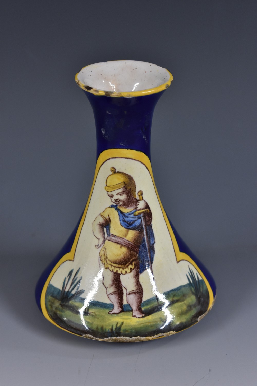 A late 19th century Continental tin-glazed flask vase,