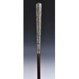 A 19th century Burmese silver-mounted walking cane,