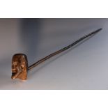 A late 19th century Folk Art pipe, the bowl carved as the head of a bearded gentleman,