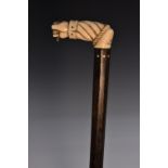 A 19th century Colonial marine ivory and ebony walking cane,