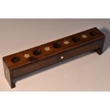 A Chinese hardwood incense stand, the flush rectangular top with five circular apertures,