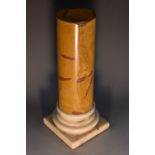 A Grand Tour type marbled column, turned marble socle and base,