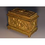 A 19th century French gilt metal musical casket, in relief overall with birds,