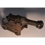A Chinese soapstone carving, of a ship's deck hongyipao or cannon,