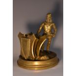 A 19th century brass novelty desk top letter rack, as a renaissance soldier,
