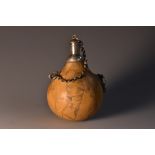 A Corsican gourd flask, engraved with a portrait of Napoleon Bonaparte and inscribed Ajaccio,