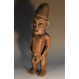 Tribal Art - a Yaka fertility figure, elongated head, standing nude, 33cm high,