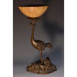 A 19th century dark patinated bronze novelty goblet, cast as an ostrich,