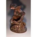 A 19th century Black Forest spill vase and inkwell, boldly carved with an eagle and a fox,
