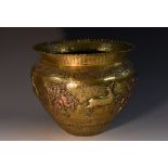 A 19th century Indian brass and copper ovoid jardiniere,