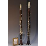 A 19th century clarinet, by Jacques Albert, Brussels, sold by W D Cubitt, London, stamped,