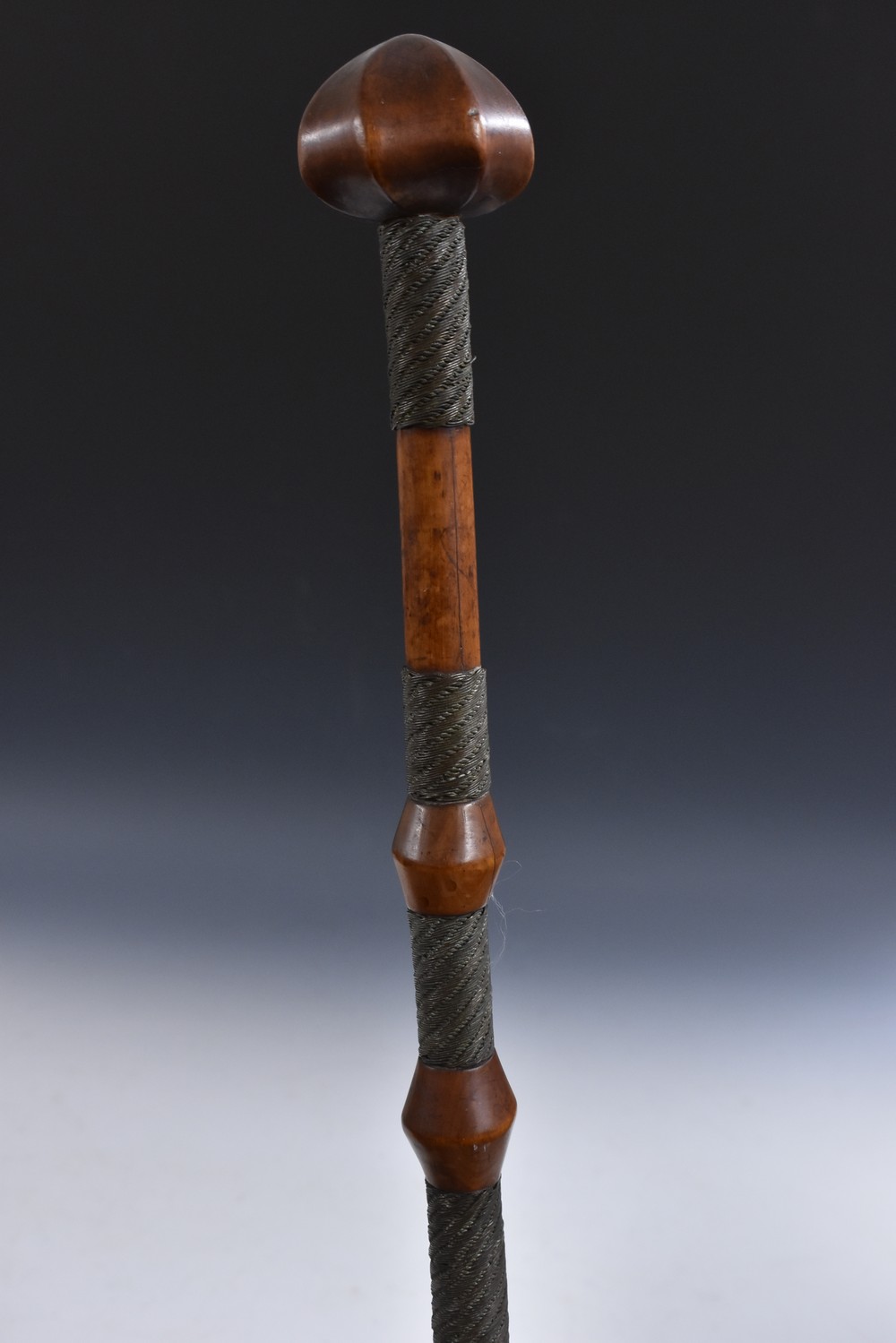 Tribal Art - a Zulu hardwood Chief's status or prestige staff, of knobkerrie form, fluted head,