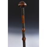 Tribal Art - a Zulu hardwood Chief's status or prestige staff, of knobkerrie form, fluted head,