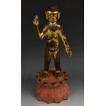 Tibetan School, a gilt and cold painted study, of a Buddhistic figure, he stands nude,