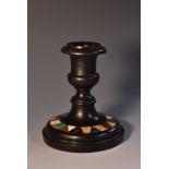 A 19th century Derbyshire Ashford marble candlestick, campana sconce,