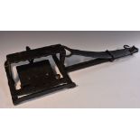 A 19th century iron gamekeeper's estate man trap, rectangular jaws, long setting spring,