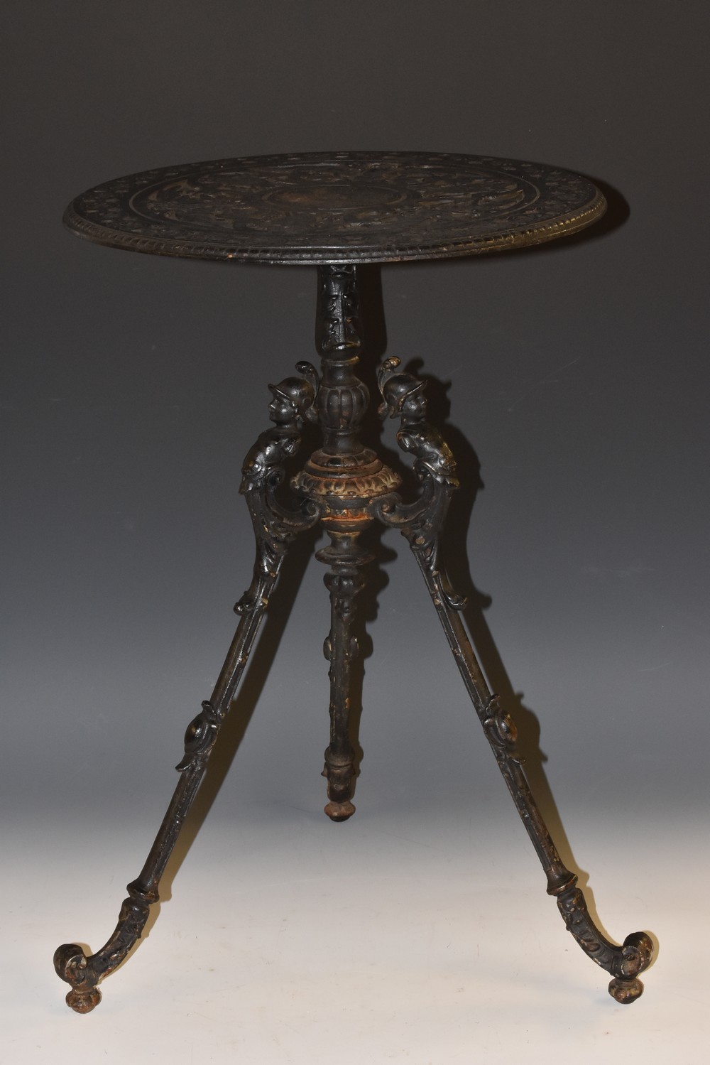A 19th century cast iron occasional table,