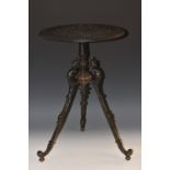 A 19th century cast iron occasional table,