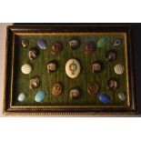 An arrangement of 19th century button mounts, of various designs and decoration,