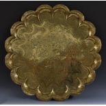 A large Indian brass shaped circular tray,