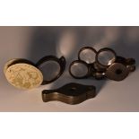 A 19th century tortoiseshell three-lens connoiseur's eye glass or jeweller's loop,