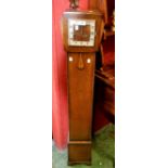 A 1940's oak grandmother clock.