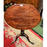 A George III oak tripod table