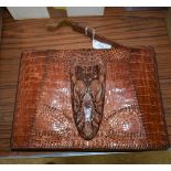 A mid 20th century crocodile skin handbag incorporating head,