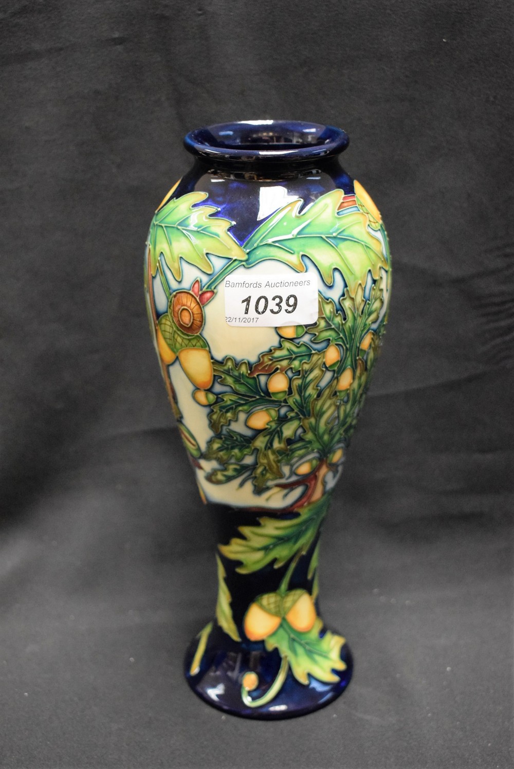 A contemporary Moorcroft slender inverted baluster vase, designed by Philip Gibson, signed,