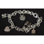 A Tiffany and Co style a silver charm bracelet