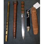 A leather cased optical instrument; a treen instrument; a brass flute;