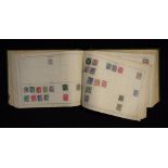 Stamps - an Edward VII improved stamp album,